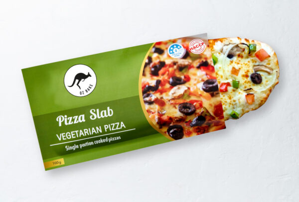 oz bake open vegetarian pizza wrap inside the packaging with the pizza coming out the top ready to eat from it's pie warmer ready packaging